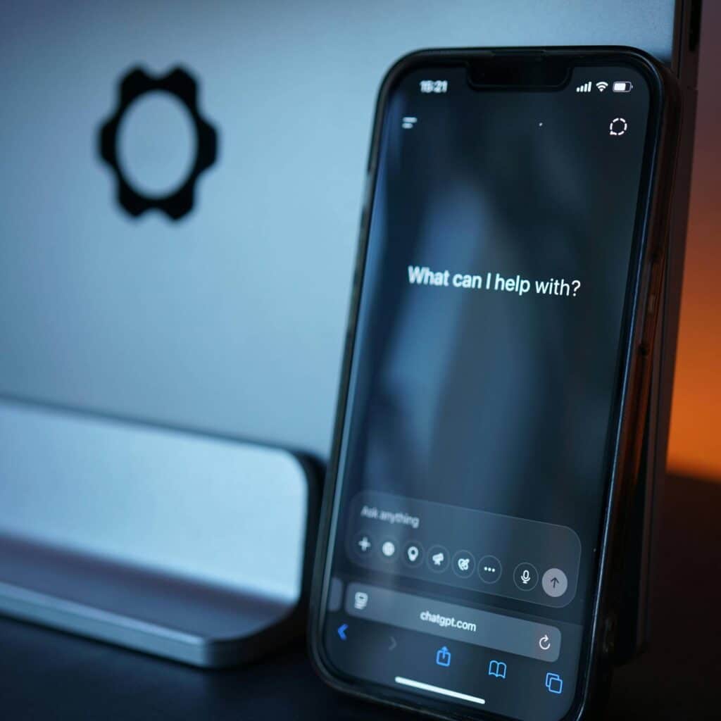 A phone with an AI LLM model saying 'how can I help?'